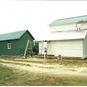 Two barns, one of left removed